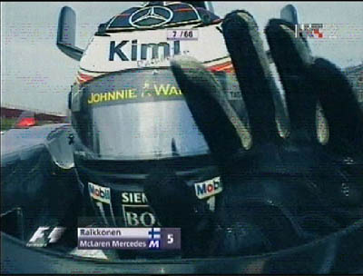 Kimi Raikkonen waves to the camera during the Spanish Grand Prix